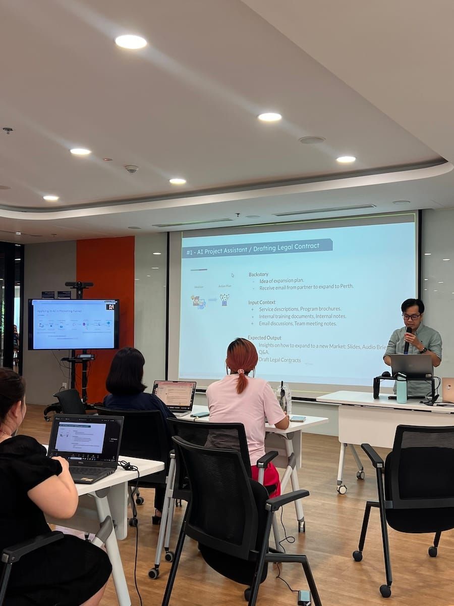 Alpha Bits AI Workshop — presenter demonstrating AI workflow tools on stage